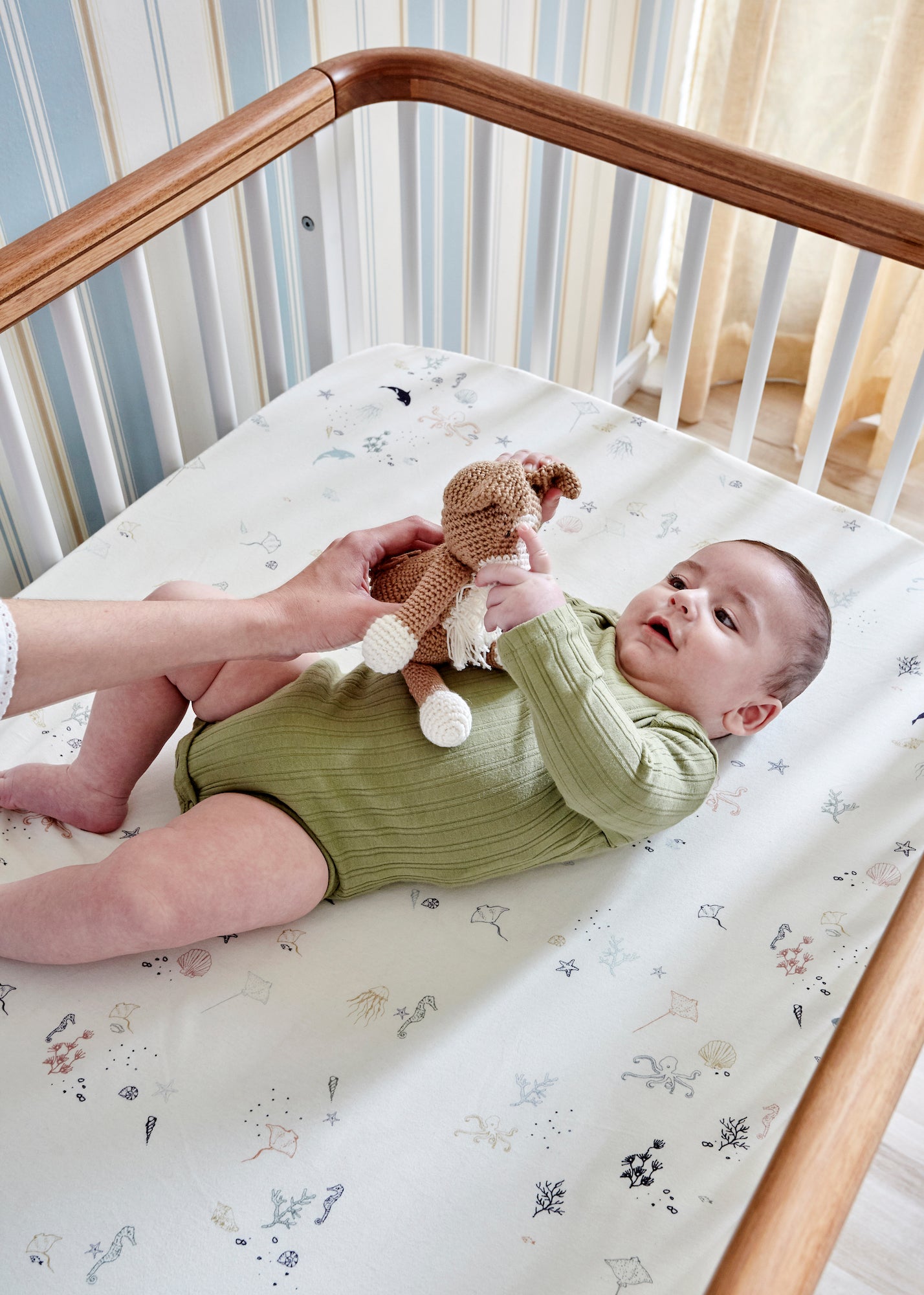 What Is a Crib Mattress Pad & Does Your Baby Need One?