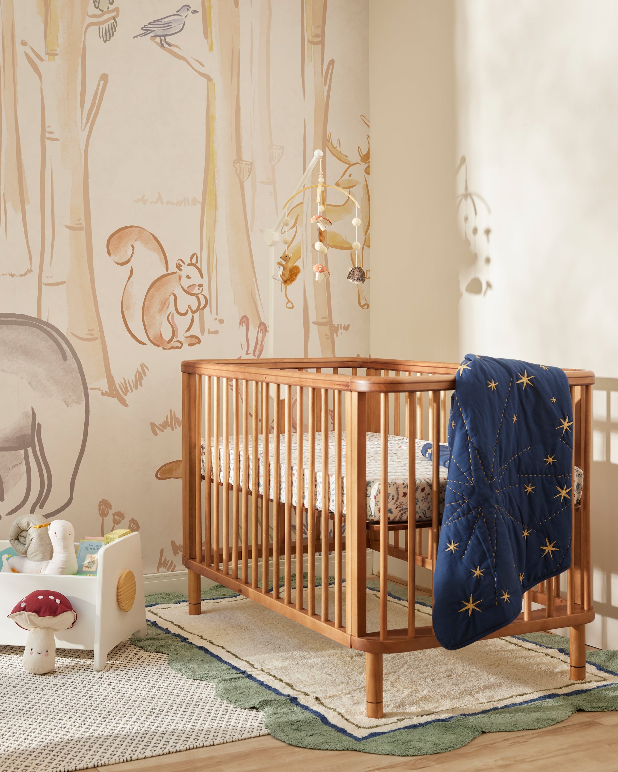 Light wood hot sale baby crib